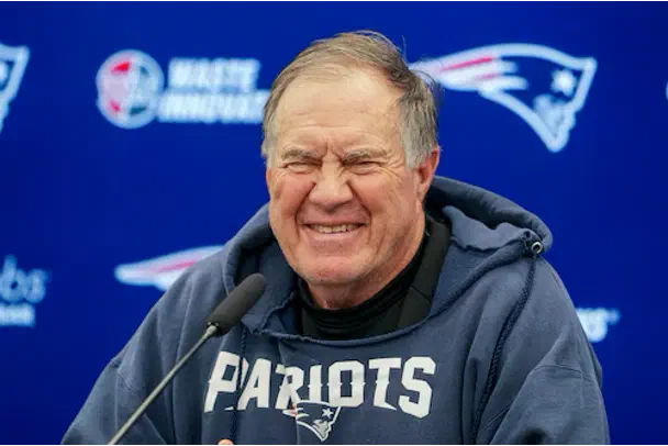 Bill Belichick smiling — celebrating wins together as a team